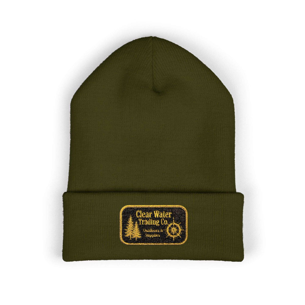 An olive green knit beanie with a folded cuff, featuring a rectangular embroidered patch on the front that reads 'Clear Water Trading Co' with a yellow border and tree graphic, set against a plain white background.