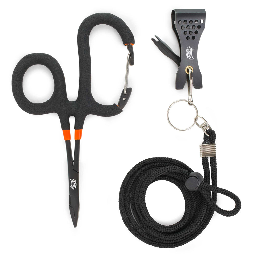 Set of black shears, carabiner, and lanyard on a white background