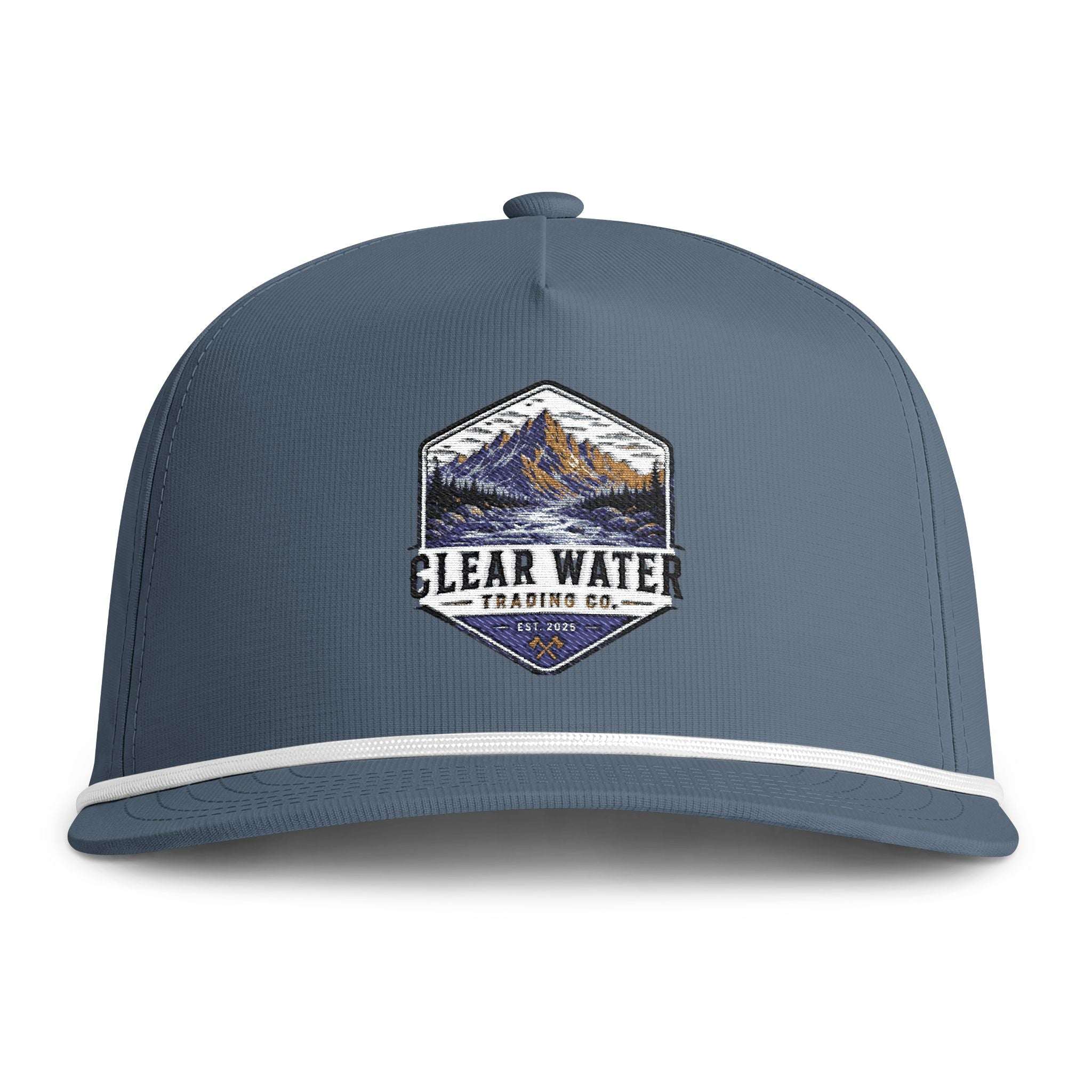 A slate blue snapback cap featuring a white stripe along the brim and a central embroidered patch with a mountain design and the text 'CLEAR WATER TRADING CO.'.