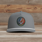 Gray cap with a colorful patch featuring a skull and text on a white background