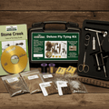 Stone Creek Deluxe Fly Tying Kit with various fly tying materials and tools on a white background.