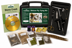 Stone Creek Deluxe Fly Tying Kit with various fly tying materials and tools on a white background.