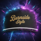 A black baseball cap with 'Burnside Style' written in gold script on the front, set against a dramatic dark background with purple and blue lightning effects.
