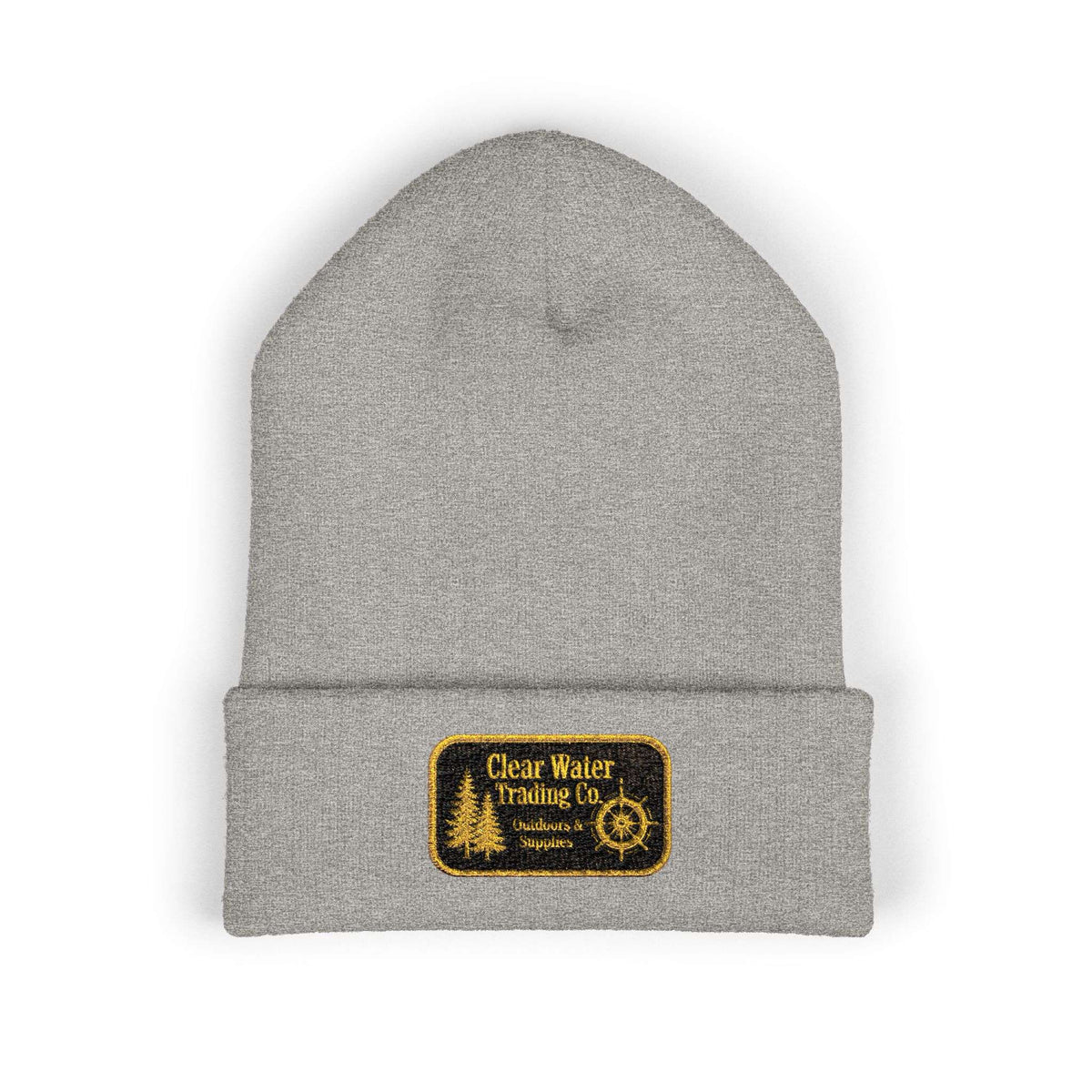 A light gray heather knit beanie hat with a folded cuff, featuring a rectangular embroidered patch on the front that reads 'Clear Water Trailing Co' with a yellow-gold border and tree graphic.