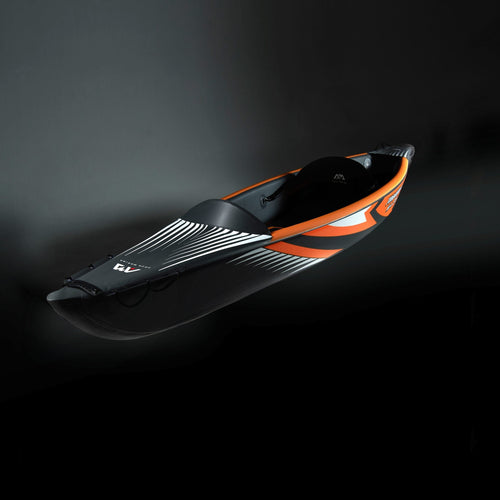 Black and orange kayak on a dark background