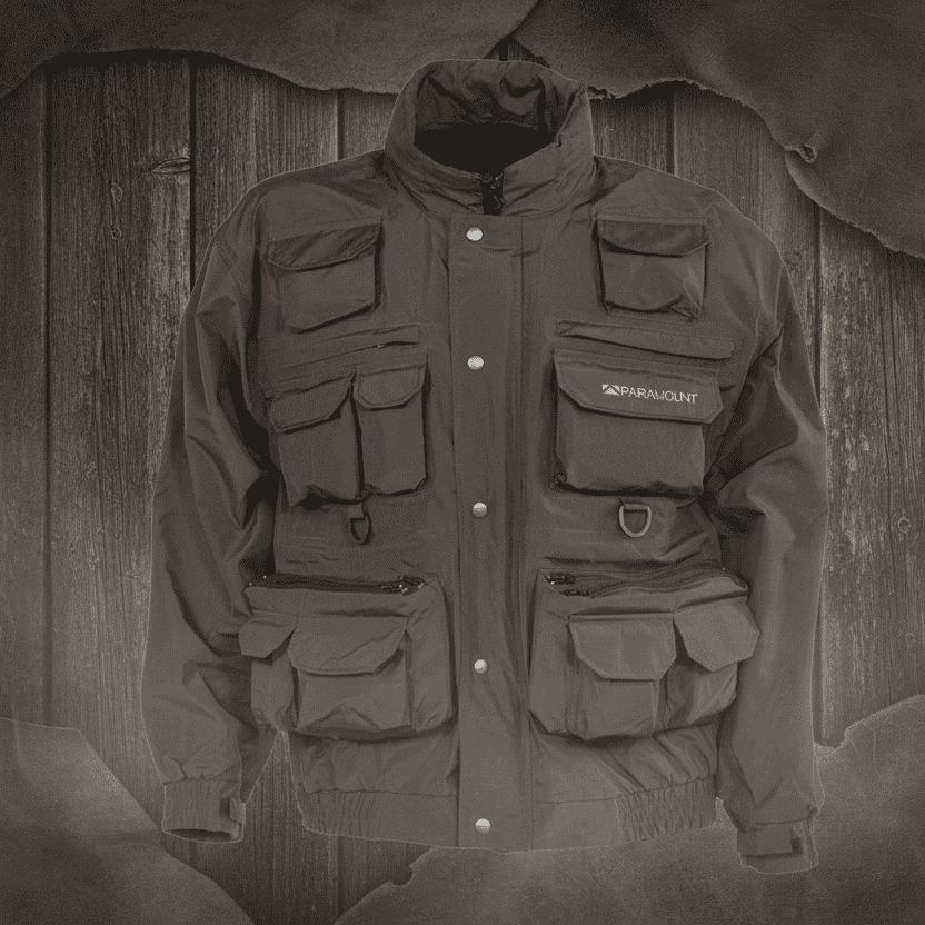 A dark brown technical utility jacket with multiple front pockets, a high collar, and a visible 'SEMPERMOUNT' logo on the chest, shown against a plain white background.
