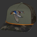 Flying Wood Duck Trucker Hat | Detailed Wing Spread Embroidery on Sage Green Crown with Dark Camo Brim — Clear Water Trading Co. - Clear Water Trading Co.