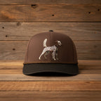 Brown cap with a dog illustration on a white background