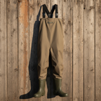 Brown waders with green boots on a white background
